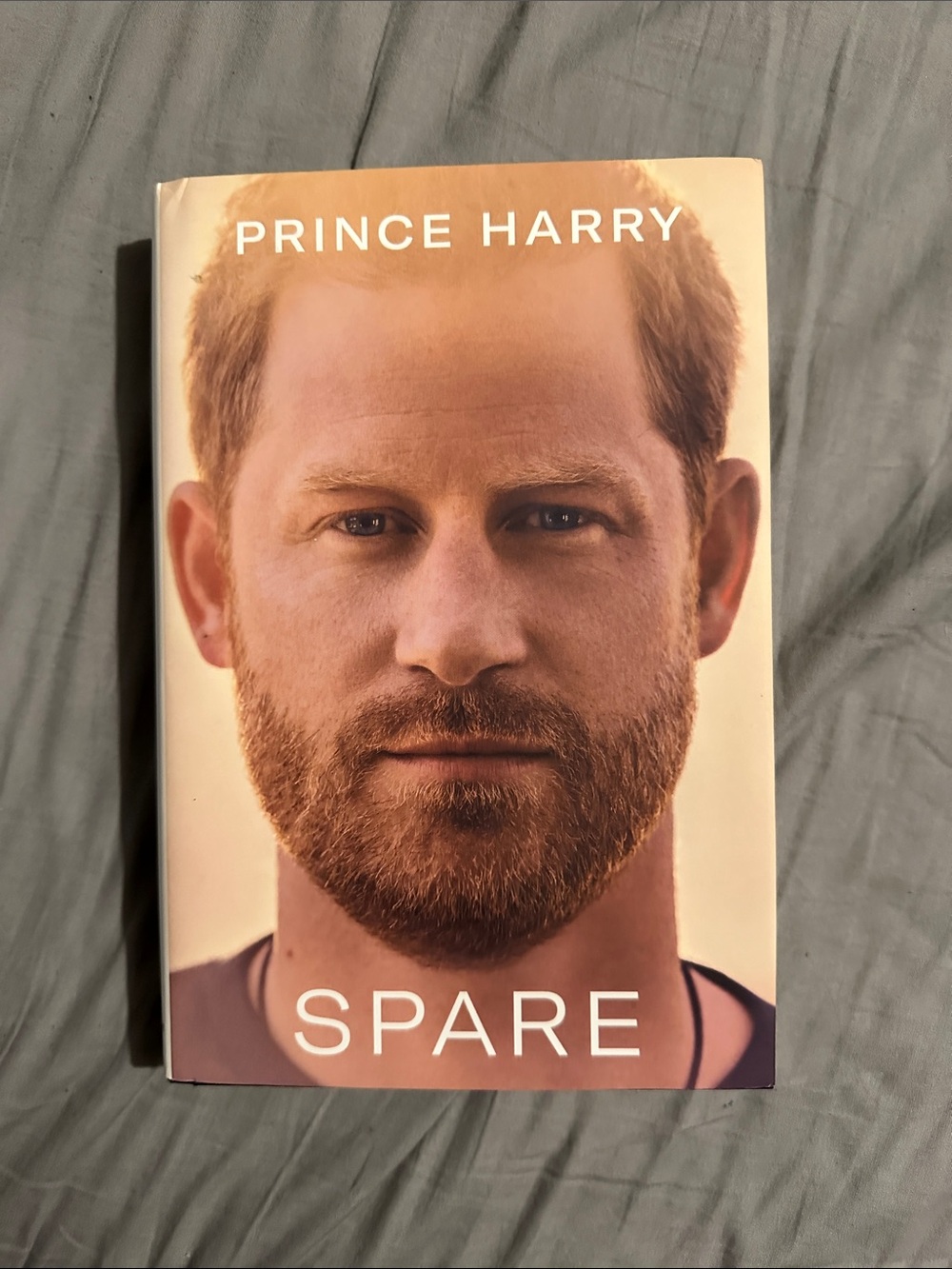 'Spare' Book - Paperback, Beige Cover